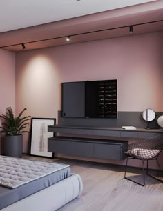 a bed room with a neatly made bed and a flat screen tv mounted on the wall