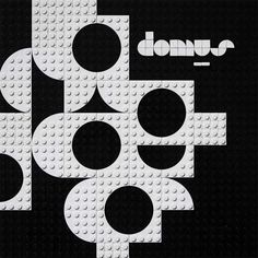 a black and white poster with circles on it