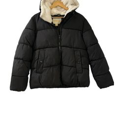 Brand New With Tags, No Issues Or Flaws To Mention. Tag Price Is $80. Top Of Shoulder To Bottom Hem Measurement Is Approximately 25 Inches, Armpit To Armpit Measurement Is Approximately 19 Inches. Elevate Your Winter Wardrobe With This Stylish Madden Girl Sherpa Hooded Puffer Jacket, Perfect For Any Outdoor Activity. The Black Jacket Is Made Of Polyester And Features A Full Zipper With Button Accents, Long Sleeves, And An Elastic Waist For A Classic Fit. The Jacket's Bodywarmer And Padded Design Girls Puffer Vest, Black Winter Jacket, Short Puffer Jacket, Girls Puffer Jacket, Quilted Parka, Black Puffer Vest, Long Puffer Coat, Hooded Puffer Jacket, Hooded Faux