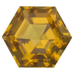 a yellow diamond on a white background