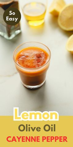 lemon olive oil recipe in a small glass bowl on a counter with sliced lemons