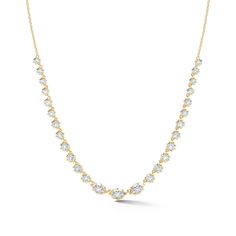 This tennis-style eternity necklace is the perfect hint of classic while firmly rooted in the present. The Maverick Diamond Riviera Necklace combines the classic tennis silhouette with our signature Alchemy setting to bring forward a modern feel. Handcrafted in 18-karat gold and featuring 3 marquise-shaped and 22 round, brilliant cut diamonds, the Maverick Riviera Necklace is a show-stopping must-have for any jewelry collection. Combine this necklace with heavier chain pieces like the Pia and Ph Big Diamonds Necklace, Tennis Silhouette, The Sophisticate, Riviera Necklace, Eternity Necklace, Tennis Style, Marquise Shape Diamond, Bespoke Engagement Ring, Heavy Chain