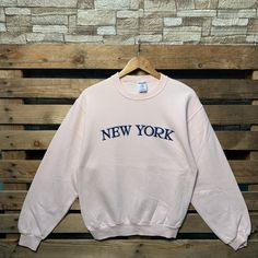 Vintage New York City Sweatshirt New York  Crewneck Jumper New York Pullover Sweater New York City Logo Graphic Pink Colour Small Size Brand Name :- Jerzees 📌 Tag Size :-  Small 📌 Recommend Size :- Small Manual Measurement :- WIDTH (armpit to armpit) :- 19 inches / 48cm LENGTH (shoulder to end of garment) :- 25 inches / 64cm Condition :- Good Condition 8/10. Minor Defect Stain Refer Picture. 📮FED EX / DHL EXPRESS = 3-6 business day arrived New York Crewneck, City Sweatshirt, City Logo, Vintage New York, Pink Colour, Logo Graphic, Dhl Express, Pullover Sweater, Pullover Sweaters