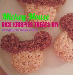 three rice krispies are on a plate with the words mickey mouse written above them