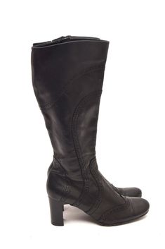 If you are looking for a pair of boots that are stylish, comfortable, and versatile, look no further than these vintage 90s pebbled leather tall boots. These boots are made of genuine leather that has a pebbled texture, giving them a unique and rugged appearance. The chunky heel is about 2.5 inches (6 cm) high, providing stability and support for your feet. The rounded toe shape is flattering and comfortable, and the shaft is about 13 inches (34 cm) high, reaching just below your knees. These bo Retro Mid-calf Leather Boots With Round Toe, Retro Leather Mid-calf Boots With Round Toe, Vintage Faux Leather Boots For Fall, Vintage Faux Leather Boots With Round Toe, Vintage Faux Leather Round Toe Boots, Vintage Boots With Leather Sole And Square Toe, Retro Leather Winter Boots, Retro Knee-high Fall Boots, Retro Knee-high Boots For Fall