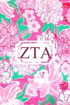 a pink and green floral print fabric with the letter zta in white on it