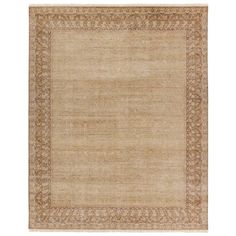 a beige rug with an intricate border on the top and bottom, in front of a white background