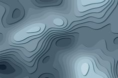 an abstract blue background with wavy lines and drops of water on the surface, as if it were cut from paper or cardboard