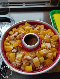 a pan filled with food sitting on top of a counter