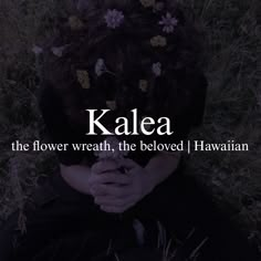 a woman sitting in the grass with her hands over her face and text that reads kalea, the flower wreath, the beloved hawaiian