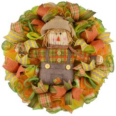 a wreath with a scarecrow on it