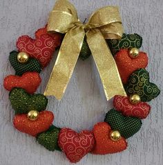 a christmas wreath with strawberries and bells