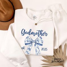 Do you know the perfect cool godmother? If so, this design makes a great baptism gift, announcement gift, Christmas gift, or treat yourself purchase to show your love for your favorite godmother! This classic, unisex crewneck will fit like a well-loved favorite from its first wear. Our ultra-soft Gildan crewnecks feature... -Medium-weight fabric with a 50/50 cotton & polyester blend -Tear away label and no side seams -True to size fit- available in a range of sizes! Questions about sizing? Please refer to the size chart included in our listings! When shopping with our store, please remember... -Items typically ship within 2-7 business days after your order is received -Because we custom print each garment after we receive your order, all sales are final and we are unable to accept returns Godparent Proposal, Godmother Proposal, God Parents, Proposal Gifts, Baptism Gifts, Creative Outlet, Godmother, San Jose Ca, Gift Christmas