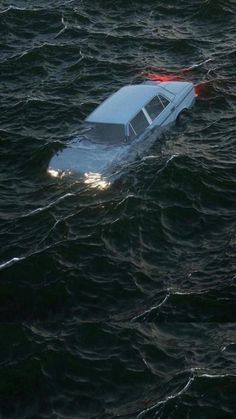 a car that is floating in the water