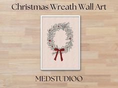 the christmas wreath wall art is displayed on a wood floor with text overlaying it