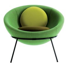 a green chair with a yellow ball on it's back and some black legs