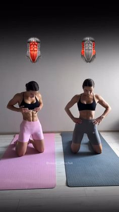 two women are doing yoga on mats in front of a wall with muscles and their arms