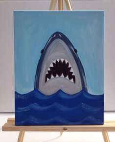 a painting of a shark with it's mouth open