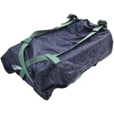 a duffel bag sitting on top of a white floor