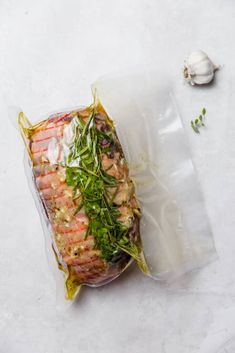 an image of food wrapped in plastic on the table