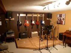 a room with guitars and other musical equipment