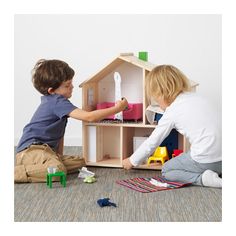 FLISAT Doll house/wall shelf IKEA This doll’s house lets your child make a home for their dolls and play with them. Ikea Flisat Dollhouse, Flisat Dollhouse, Kids Wall Shelves, Kids Storage Furniture, Ikea Dollhouse, Hanging Bookshelves, Ikea Flisat, Police Chase, Ikea Family