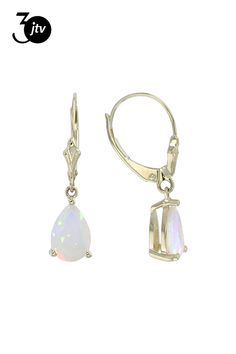 1.53ctw Pear Ethiopian Opal 10k Yellow Gold Dangle Earrings. Measures Approximately 1.10"L x 0.25"W. Leverbacks. Fine Ethiopian Opal Jewelry In Gold, Dainty Ethiopian Opal Jewelry, Ethiopian Opal Earrings, Yellow Gold Ethiopian Opal Multi-stone Jewelry, Ethiopian Opal Multi-stone Jewelry In Yellow Gold, Gold Earrings Dangle, Ethiopian Opal, Pretty Jewellery, Opal