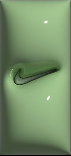 an abstract photograph of a green object in the shape of a curved tube on a light green background