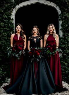 three bridesmaids standing in front of an ivy covered wall with red flowers and greenery