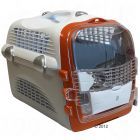 an orange and white dog carrier with its door open