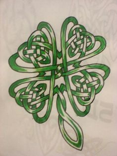 the celtic four leaf clover is shown in green and white, with text below it