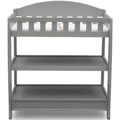 a gray baby crib with two shelves on the bottom and one shelf below it