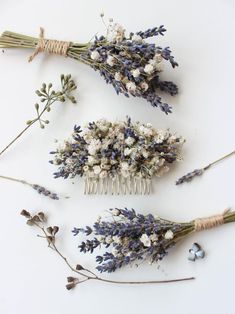 three different types of hair combs with lavender flowers on the top and blue ones on the bottom