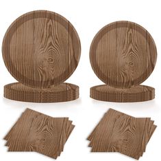 wooden plates and napkins on white background