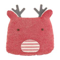 a red reindeer pillow with antlers on it's ears and nose, sitting in front of a white background