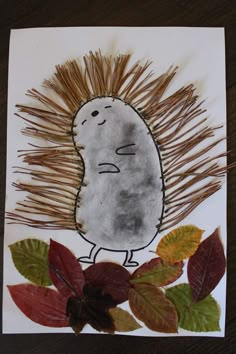 a drawing of a hedgehog sitting on top of leaves