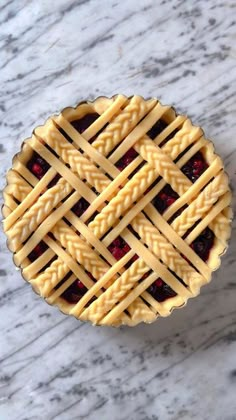 a pie sitting on top of a marble table