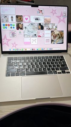 an open laptop computer sitting on top of a desk