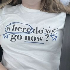 a woman wearing a t - shirt that says, where do we go now?