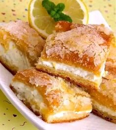 lemon filled pastries on a white plate