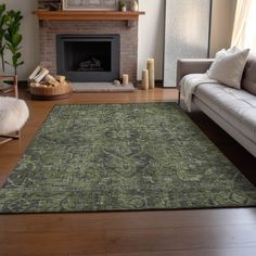 a living room filled with furniture and a fire place