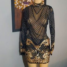 Beautiful Black And Gold See Through Sequin Dress, Has An Under Piece Attached To Keep The Dress From Going Up And Its Meant To Be Used With A Black Or Nude Bra. Nwot, New Just Tried It On. Christmas Evening Long Sleeve Mini Dress, Festive Long Sleeve Mini Dress For Party, Sheer Black Bodycon Dress For Party Season, Black Sequin Mini Dress For Winter, Black Bodycon Dress For Club Holiday, Sheer Mini Dress For Winter Party, Sheer Dresses For Winter Party, Winter Black Sequined Bodycon Dress, Sheer Cocktail Dress For Winter