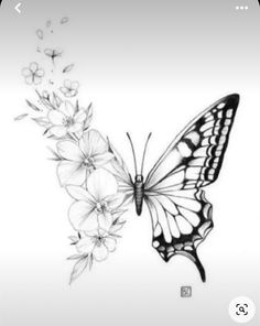 a black and white photo of a butterfly with flowers