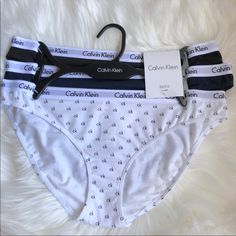 This Is A Set Of New Calvin Klein Bikini Panties. One Pair Is White With Ck Logo. Another Pair Is Navy, And Final Pair Is Navy. Size Medium. New With Tags, Never Worn. Everyone Loves Calvin Klein Undies! Calvin Klein Cotton Bottoms For Everyday, Calvin Klein Cotton Brief Bottoms, Calvin Klein Stretch Bottoms For Beach, Calvin Klein Summer Swimwear Briefs, Calvin Klein Black Elastane Bottoms, Calvin Klein Panties, Ck Logo, Calvin Klein White, Calvin Klein Women