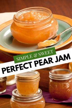 jars filled with jam sitting on top of a wooden table