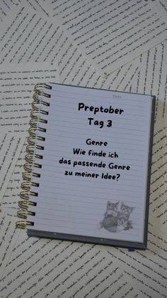 a notebook with the words preptober tag 3 written in german on top of it