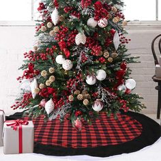 a christmas tree decorated with red and white ornaments