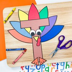 a turkey cut out with scissors and crayons