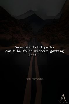 a dark road with the words, some beautiful paths can't be found without getting lost