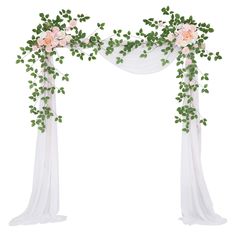 an arch decorated with greenery and flowers on a white background for a wedding ceremony